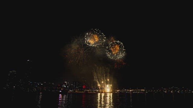 Fireworks over river