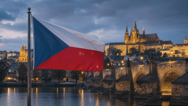 Czech flag fluttering near historic bridge