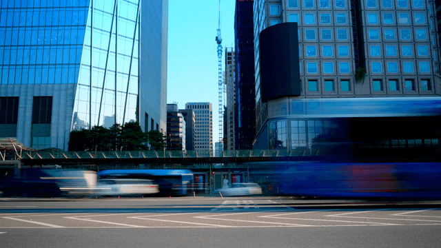 Busy city roads with various vehicles moving