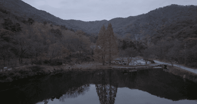 A serene lake surrounded by mountains