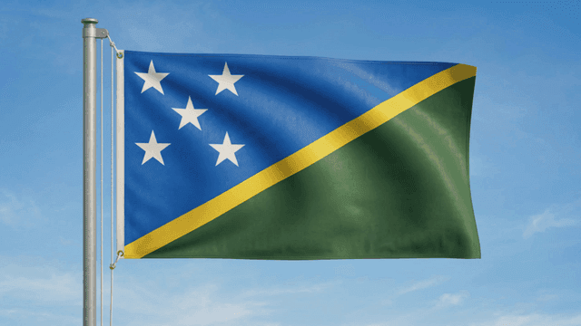 Solomon Islands flag fluttering under clear sky