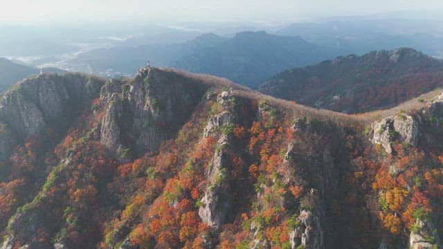 Scenic mountain range with autumn foliage