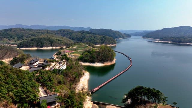 Scenic view of a lake with a traditional village