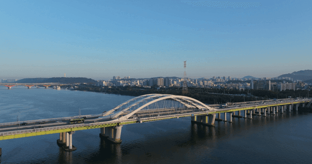 City skyline and bridges over river