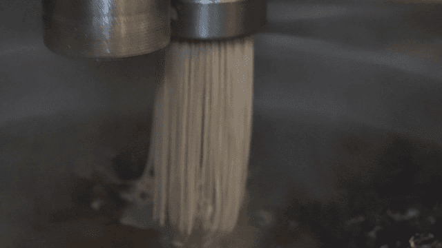 Buckwheat noodles extruded into boiling water