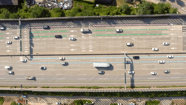 Busy highway with multiple lanes and cars