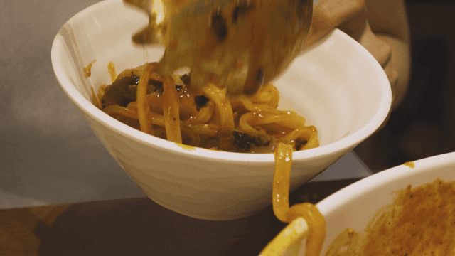 Stir-fried noodle dish served in bowl