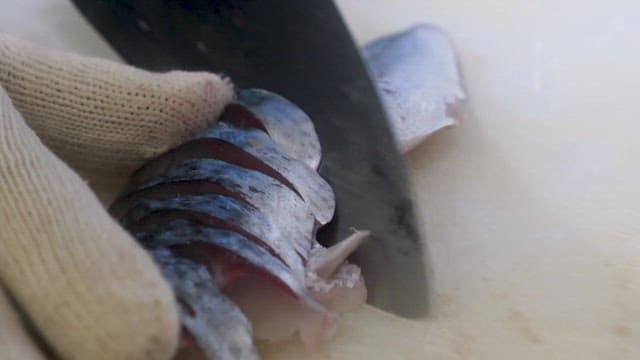 Raw Fish, Neatly Sliced ​​with Expert Skill