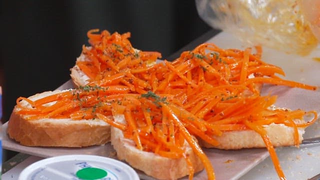 Parsley Sprinkled on Baguette Topped with Carrots