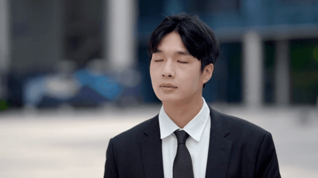 Male office worker wearing a suit to work