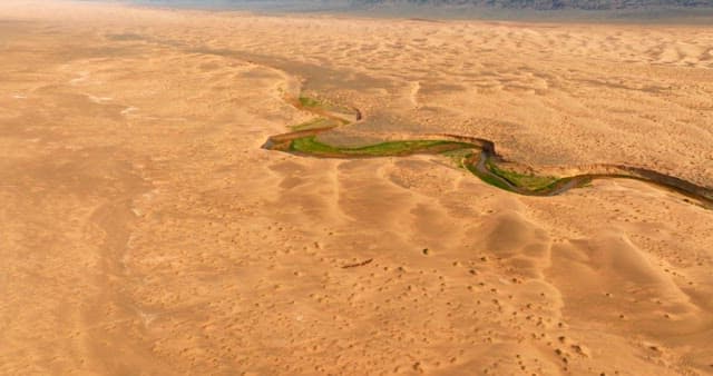 Desert with green valleys