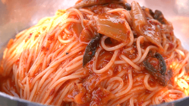 Spicy red bibim noodles with young radish kimchi
