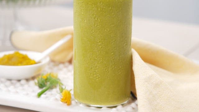 Fresh Pumpkin Juice with Metal Straw on a Tray