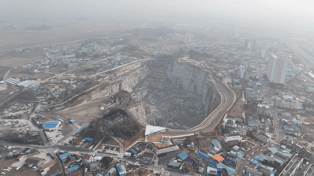 Deep and wide large quarry aerial view