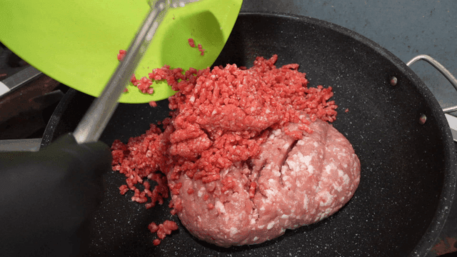 Minced meat poured into pan
