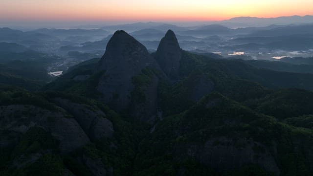 Dawning Sky and Majestic Mountains