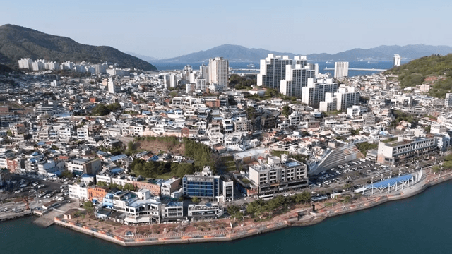Vibrant coastal city with variety of buildings