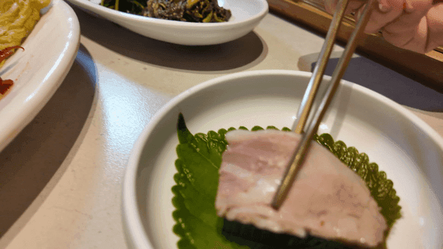 Korean boiled pork with side dishes