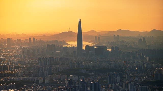 Cityscape transitioning from dusk to night