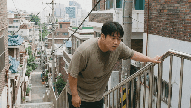 Fat man climbing stairs in neighborhood