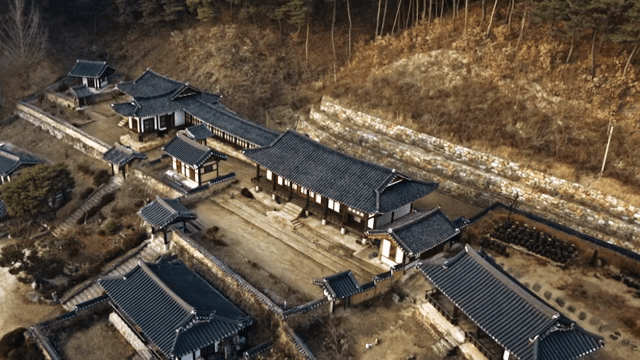 Traditional Korean houses in a forested area