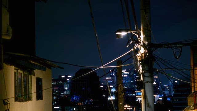 City skyline with streetlight at night