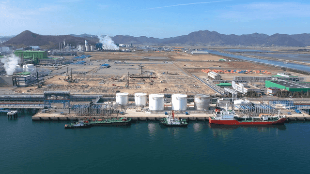 Industrial complex with ships docked