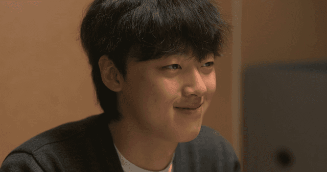 Side profile of smiling young man