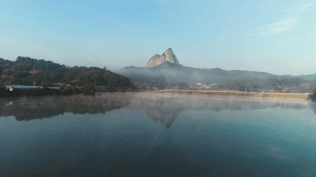 Serene lake with a mountain view