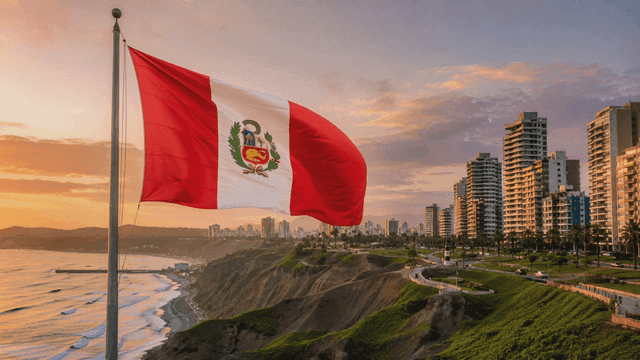 City skyline with Peruvian flag at sunset