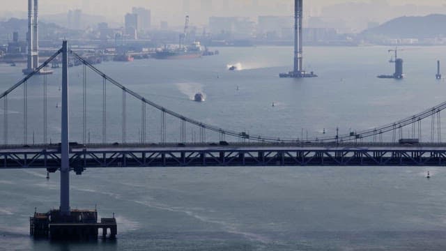 Large bridge over a calm river