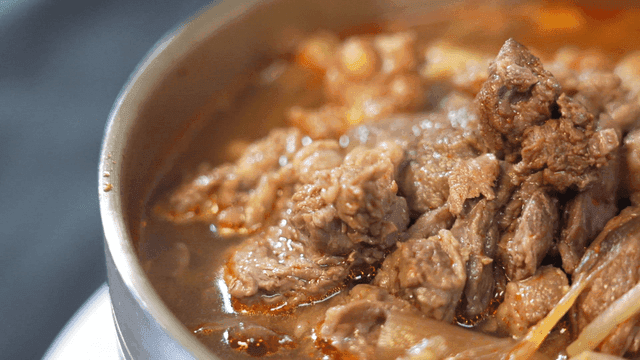 Korean beef beef soup filled with meat in bowl