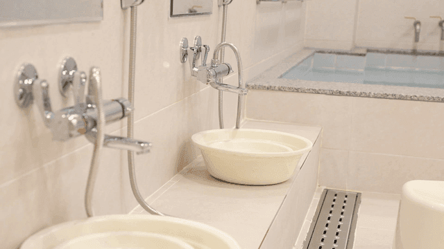 Clean bathroom with sink and bathtub