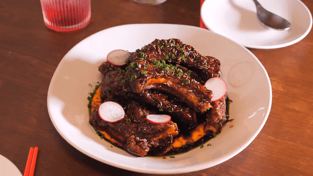 Seasoned ribs garnished with scallions
