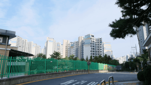 Modern apartment buildings under a clear sky