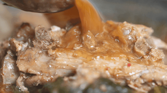 Potato stew boiling in pot