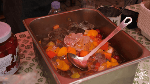 Colorful fruit salad served with ice