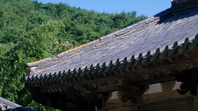 Tiled Roof of Seonamsa Temple in Korea against a Blue Sky