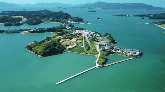 A scenic island surrounded by blue waters