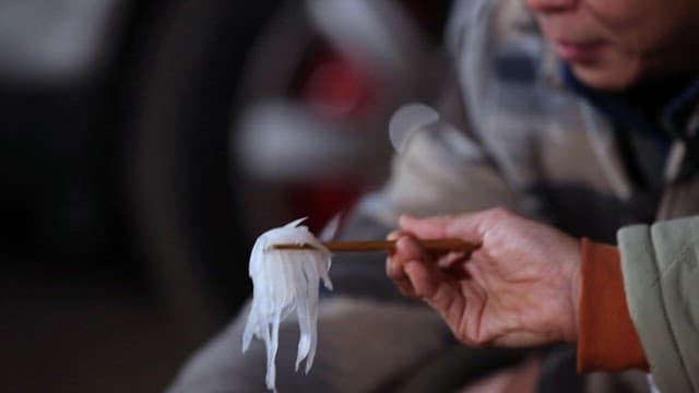 Eating Fresh and Chewy Raw Squid with Chopsticks