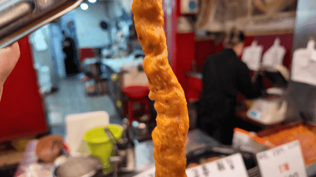 Freshly fried long squid fritters from market1
