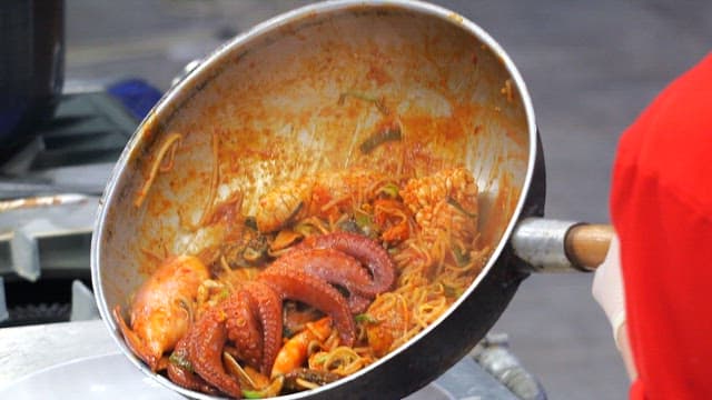 Spicy braised spicy seafood being served