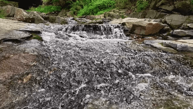 Small waterfall flowing over rocks