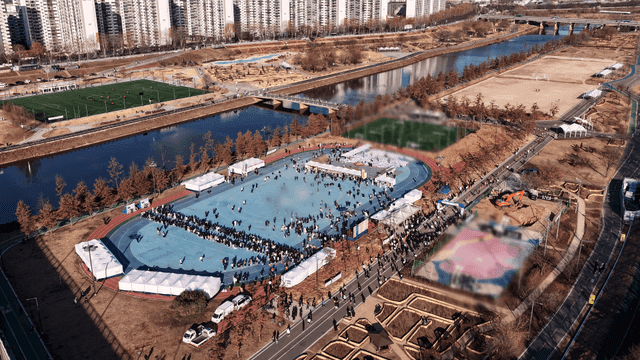 Outdoor event in a city park with many people