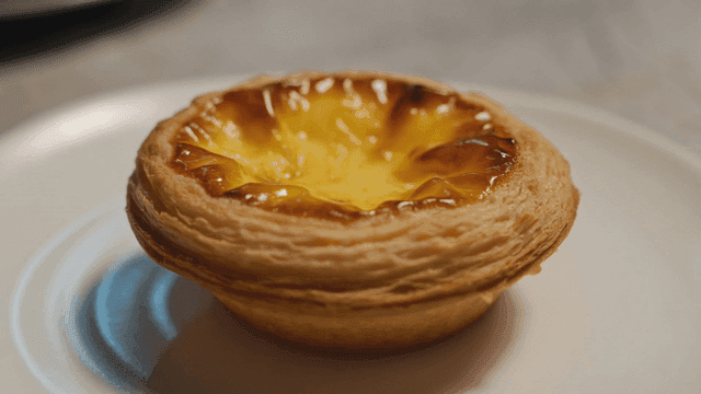 Freshly baked egg tart on plate