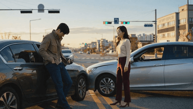 Two people discussing after a car accident