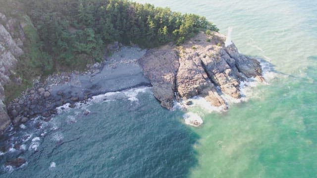 Rocky coastline with a lighthouse