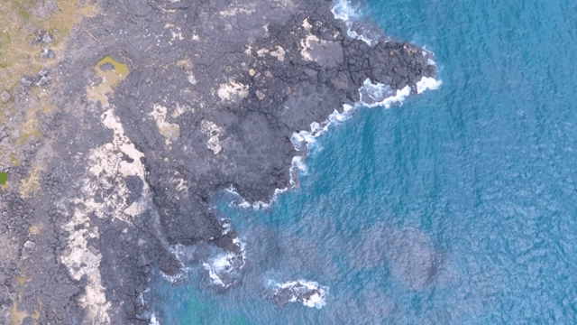 Rocky coastline with clear blue sea