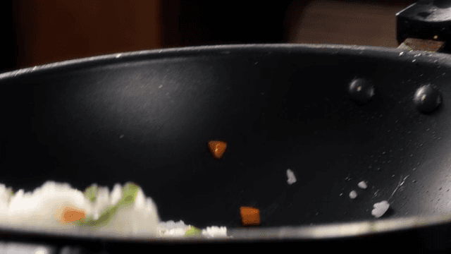 Fried rice with vegetables in a pan