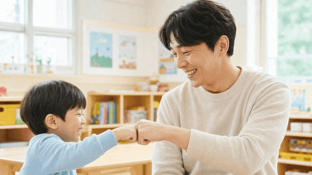 Father and son exchanging fist bump